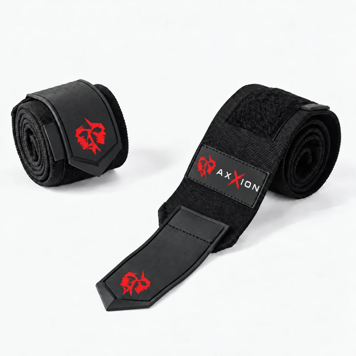 Black AXXION elbow-wrap visualisation on a pale studio background, one rolled and one partially unrolled.